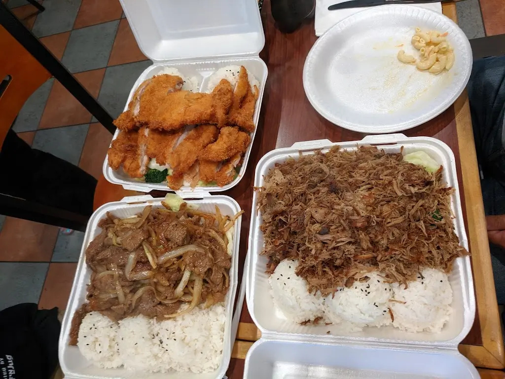 TK-Cafe-Hawaiian-BBQ-&-Dim-Sum-Hawaiian-restaurant-Assorted-Rice-Platters-Monrovia Rice platters with fried chicken, beef, and shredded pork at TK Cafe Hawaiian BBQ & Dim Sum, a Hawaiian restaurant in Monrovia
