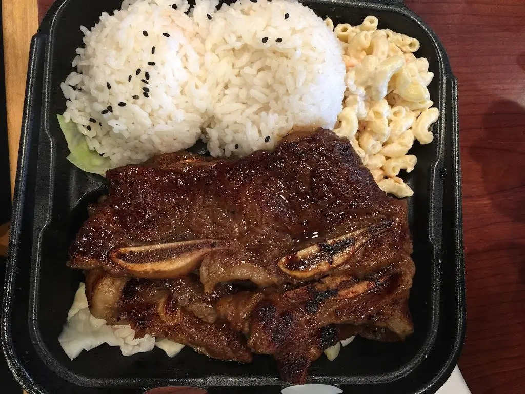 TK-Cafe-Hawaiian-BBQ-&-Dim-Sum-Hawaiian-restaurant-Grilled-Ribs-Rice-Box-Monrovia Rice box with grilled ribs, sesame rice, and macaroni at TK Cafe Hawaiian BBQ & Dim Sum, a Hawaiian restaurant in Monrovia